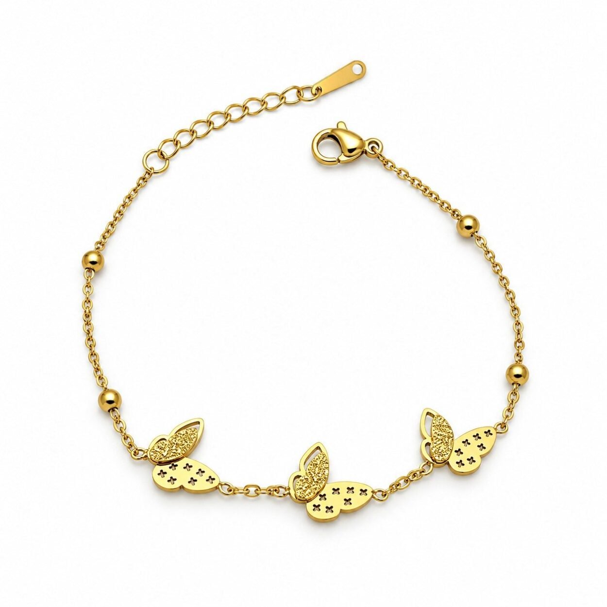 Triple butterfly gold charm bracelet with adjustable chain and delicate butterfly motifs.