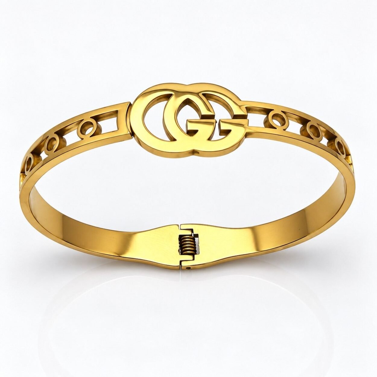 Double-G Bangle Showcase-100kb Gold statement bangle with double-circle centerpiece and polished finish. Double-G Bangle Showcase