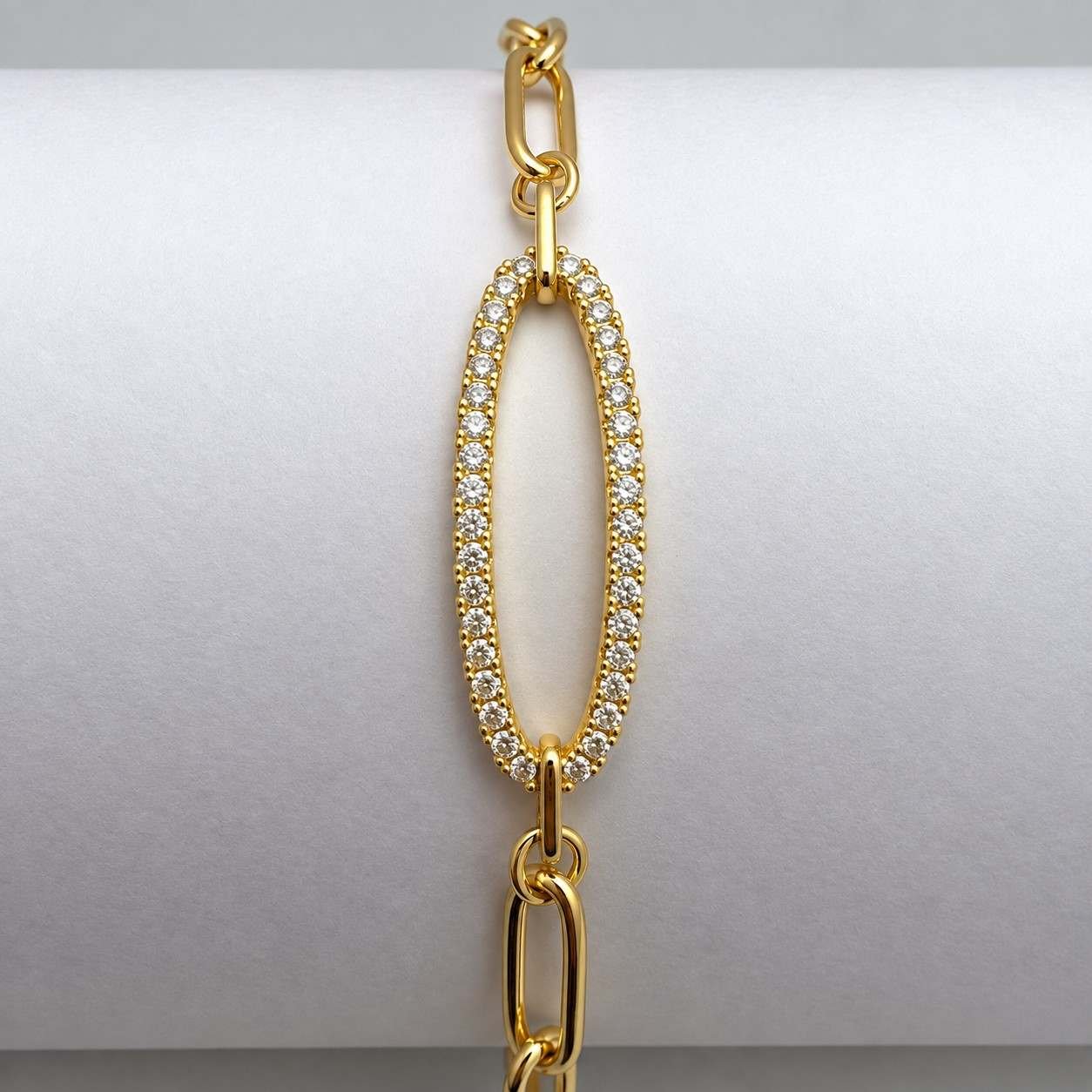SHYNEL golden paperclip bracelet with oval pavé crystal centerpiece for women
