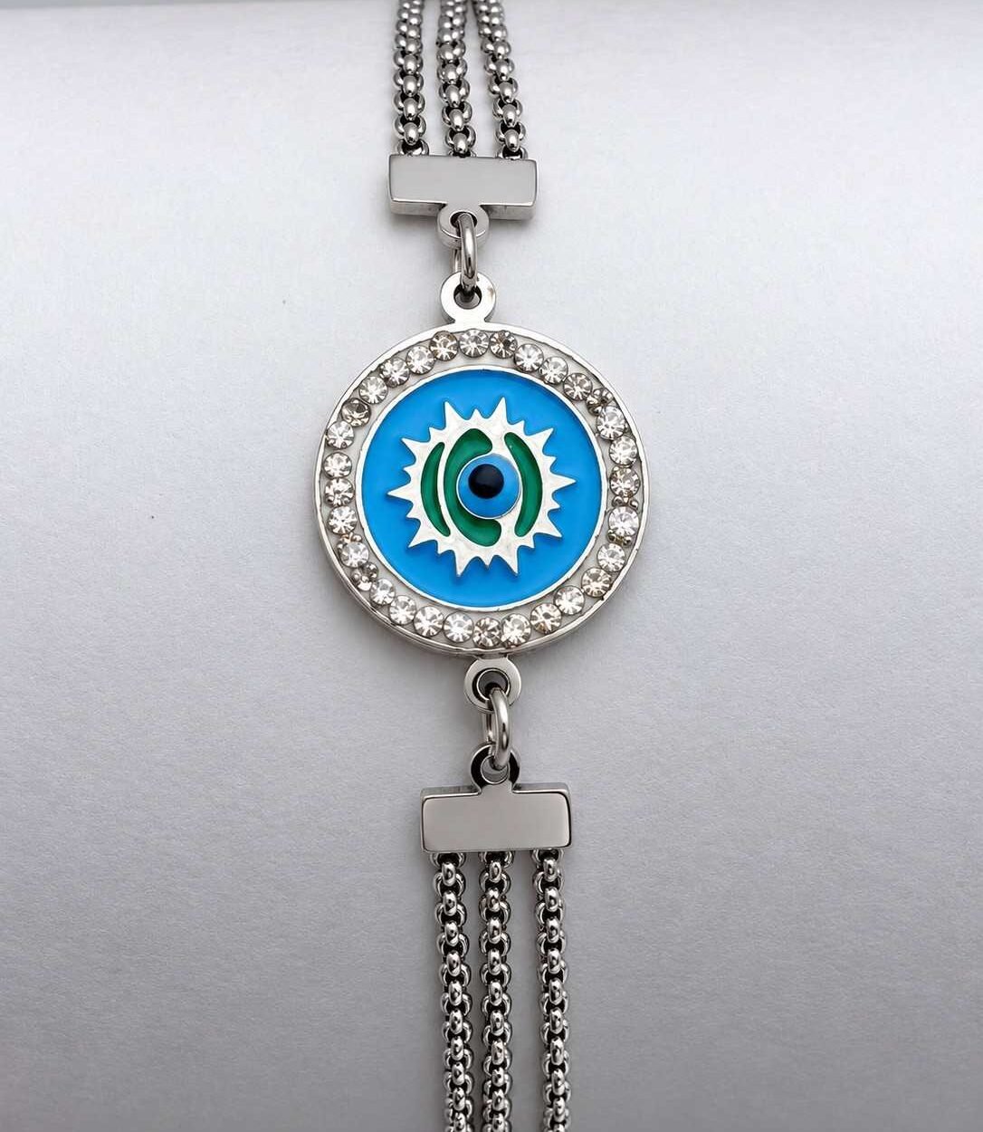 Crafted with a modern silver finish, this adjustable bracelet showcases a classic evil eye charm accented with crystals for a trendy and meaningful look.